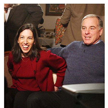 Howard, along with his wife on a show